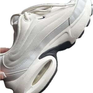 Nike Pro Max
White and Black Athletic Shoes